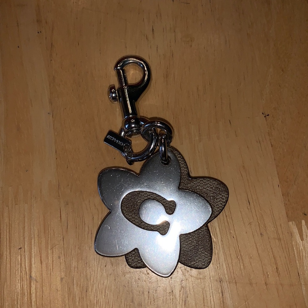 Authentic COACH flower keychain.